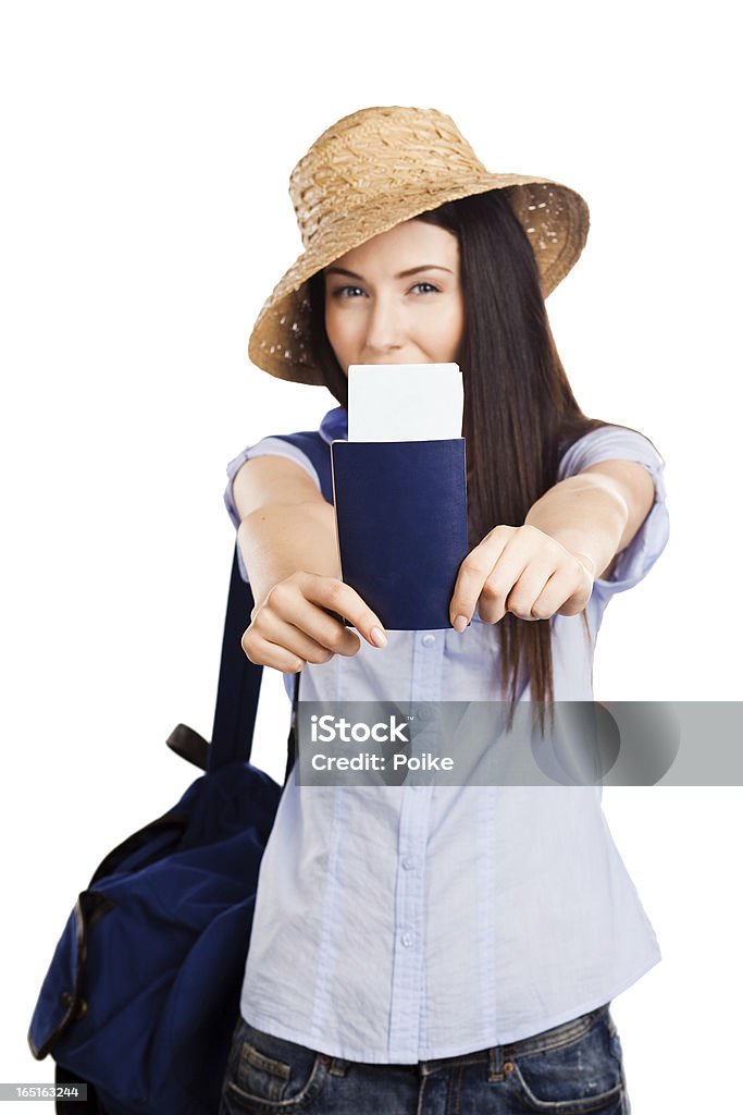 Giovane donna con passaporto in vacanza - Foto stock royalty-free di Abbigliamento