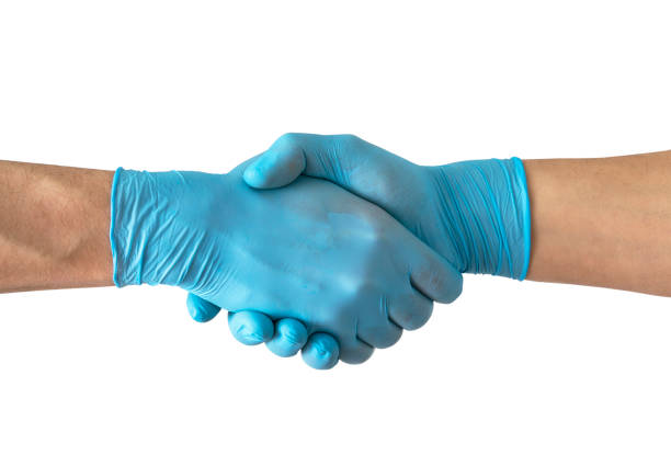 Two health workers handshake , isolated on white background