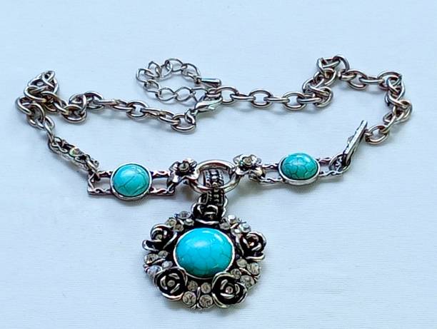 istock Silver necklace with blue pendant. 1651737174