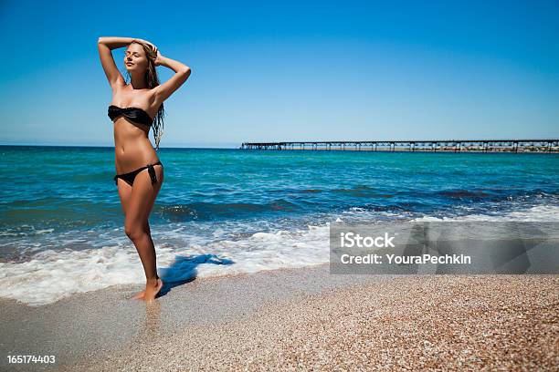 Young Woman At Blue Sea Stock Photo - Download Image Now - 25-29 Years, 30-34 Years, Adult