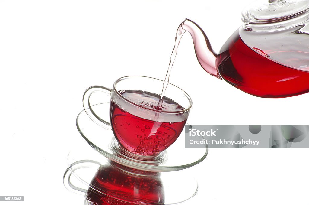tea cup Tea being poured into glass tea cup Brown Stock Photo