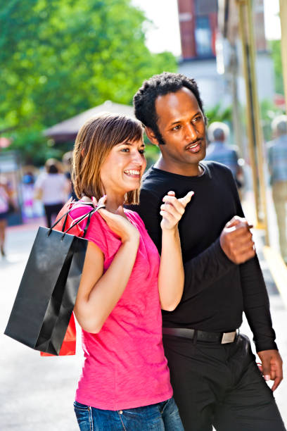 istock Couple on shopping street 165186397