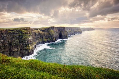 Cliffs of Moher, County Clare, Ireland, The Burren, Europe are one of Ireland's top touristic attractions. The maximum height of Cliffs is 214 m, lenght 8 km.