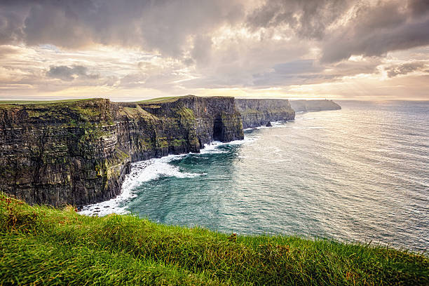 Cliffs of Moher, Ireland Cliffs of Moher, County Clare, Ireland, The Burren, Europe are one of Ireland's top touristic attractions. The maximum height of Cliffs is 214 m, lenght 8 km. the burren photos stock pictures, royalty-free photos & images