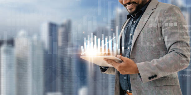 istock Indian businessman using tablet analysis sales data and economic growth graph. Business strategy digital marketing abstract icon 1651871593
