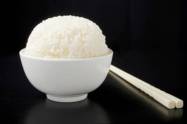 Rice bowl with chopsticks stock photo