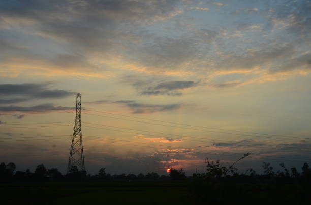 istock High voltage pole electric wiring distribution landscape energy engineering. Electricity energetic background with blue sky green mountain in countryside. Electric power energy engineering industrial 1651881777