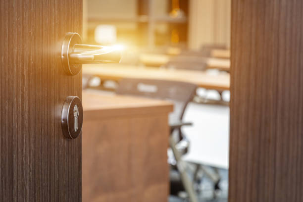 istock Open door of large training classroom, selective focus 1651898866