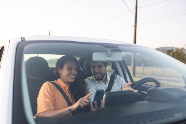 istock Couple talking in a car in traffic 1651933152