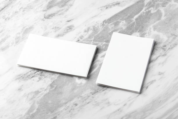 istock White business card mockup on marble table background 1651988250