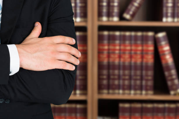 istock Midsection Of Lawyer With Arms Crossed 1652006441