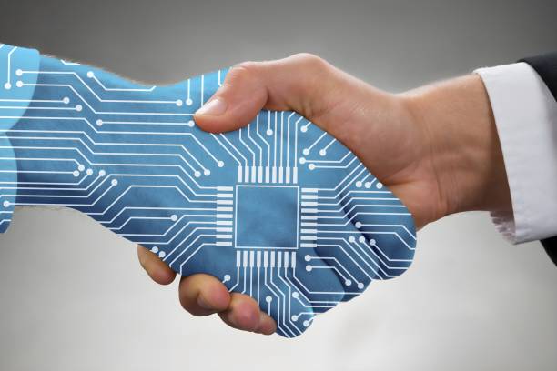 istock Digital Generated Human Hand And Business Man Shaking Hands 1652006487