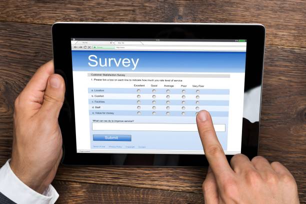 istock Businessman Filling Online Survey Form 1652006515