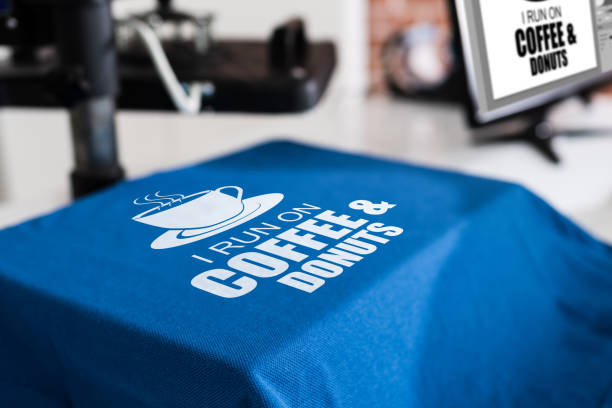 Heat Transfer T Shirt Printing Heat Transfer T Shirt Printing. Tshirt Merchandise t shirt transfer stock pictures, royalty-free photos & images