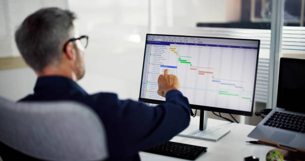istock Business Man Using Calendar Agenda Schedule 1652010791