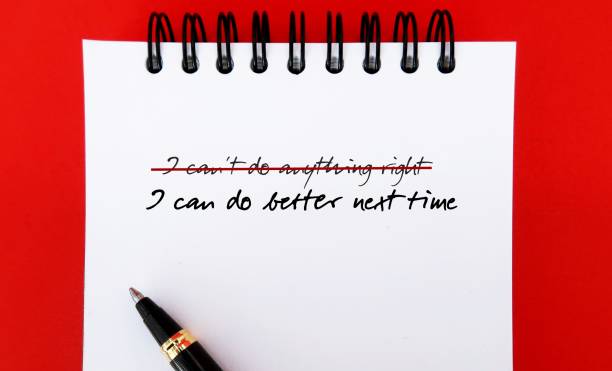 istock Handwritten text on notebook I CAN'T DO ANYTHING RIGHT, replaced with I CAN DO BETTER NEXT TIME - to challenge pessimistic self-talk by reframe negative thoughts to positive thinking and increase self-confidence 1652010890