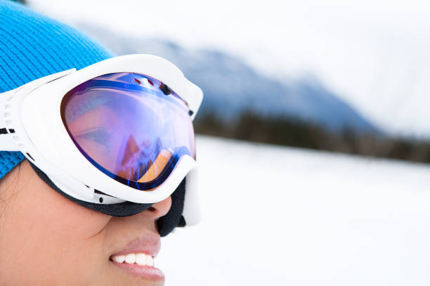 istock Smiling asian woman snowboard portrait 165201361