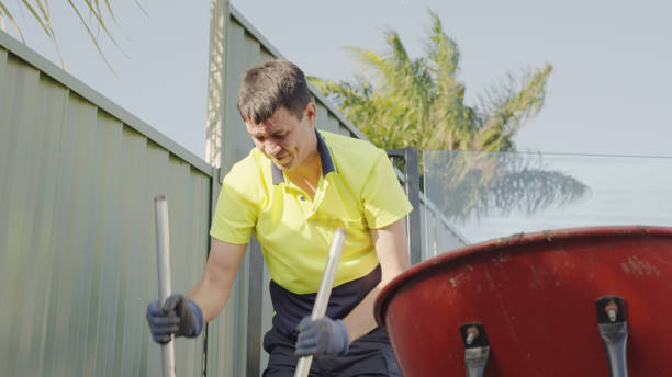 istock Mixed Asian man planting banana tree in his yard 1652013999