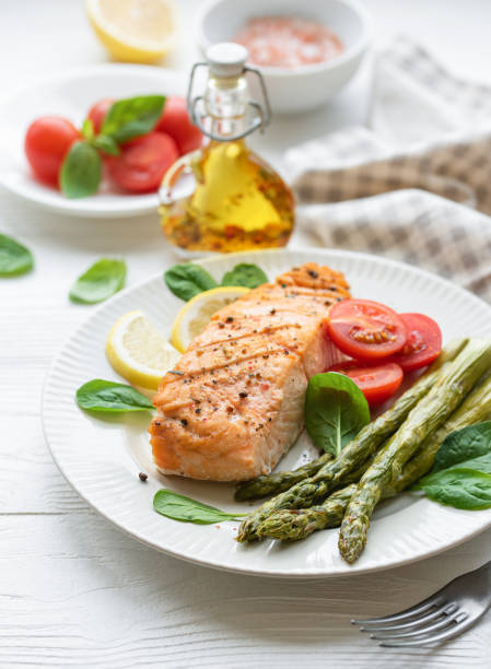 istock Baked Delicious salmon, green asparagus on  plate 1652029301