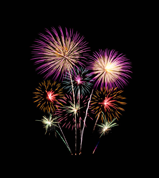 Colorful fireworks light up and explosion on black sky. New year celebration and anniversary concept
