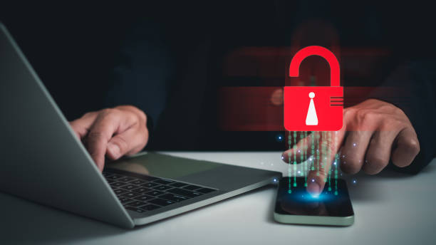 istock People's fingers are pressing on the phone screen. Represents protection against external hacks, code protection security concepts, viruses, firmware and malware. 1652045601