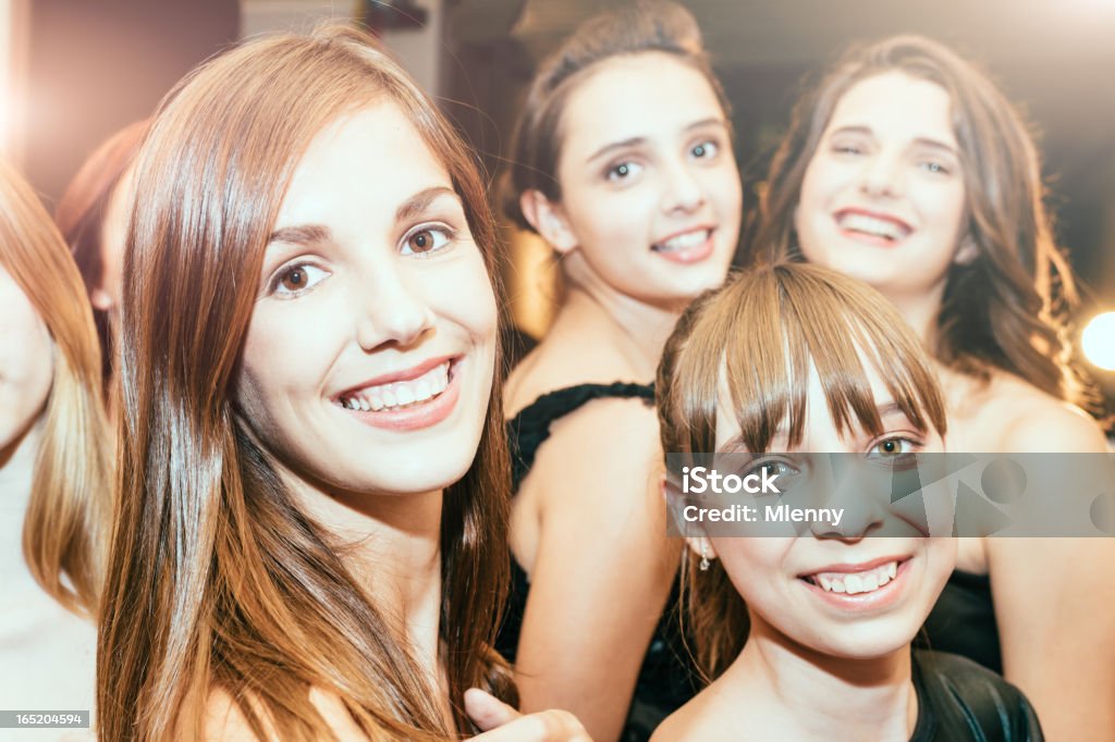 Girl's Party Girls having a party at home, young woman celebrating together with her younger sister and friends. Having fun together, smiling. Young Women's Party Lifestyle Shot. 16-17 Years Stock Photo