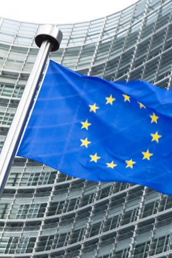 European Union flags in front of the Berlaymont building in Brussels, Belgium