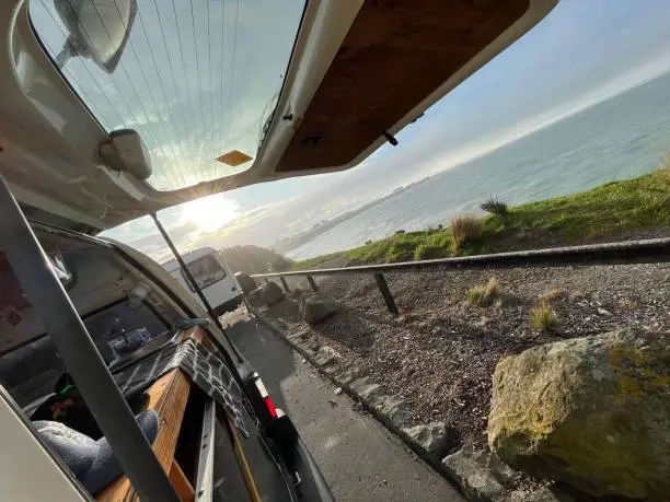 Waking up to the Sunrise in a beautiful Van at the Eastcoast, in Timaru (NZ)