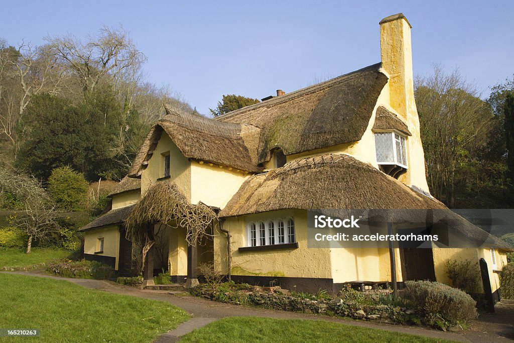 English Thatched Cottage Selworthy Somerset A picturesque thatched cottage in the village of Selworthy, Somerset, in Exmoor National Park Minehead Stock Photo