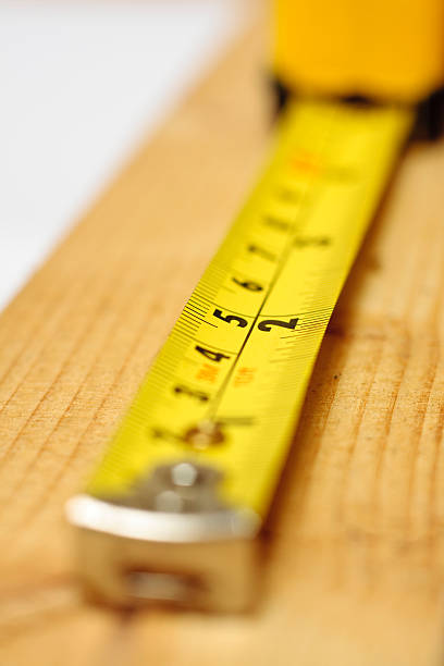istock Tape measure on wood 165210382
