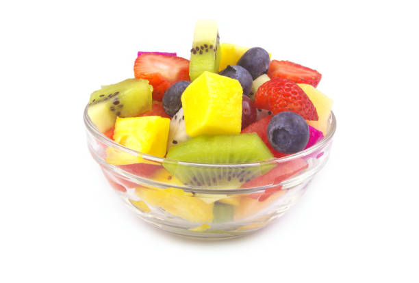 istock Bowl with fruit salad isolated on white 1652115938