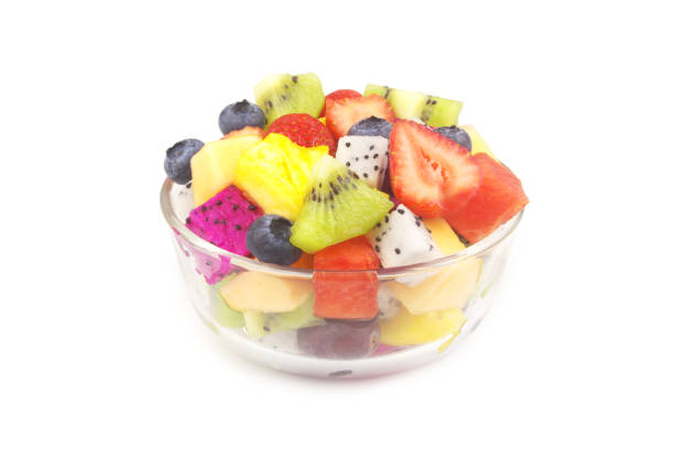 istock Glass bowl with fruit salad isolated on white 1652116463