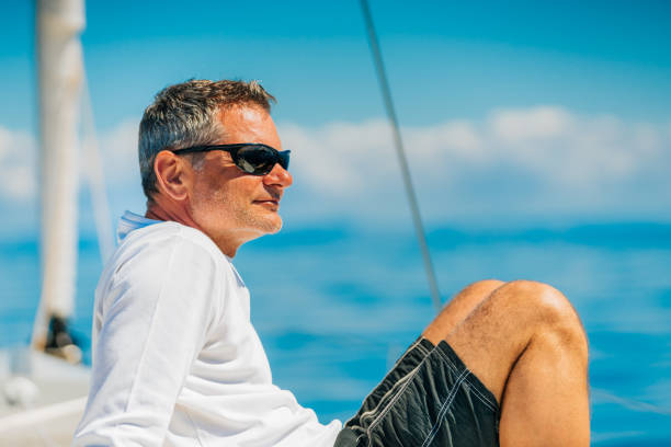 istock Crew member enjoying sailing on sailboat 1652118601