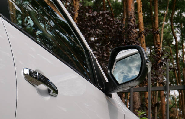 istock Bottom View Of Car Mirror With Reflection Of Clouds In It 1652144528