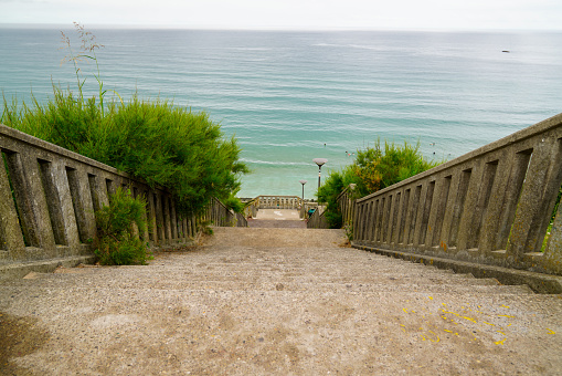 stone staircase access to sea beach in Biarritz coast Atlantic southwest ocean in france