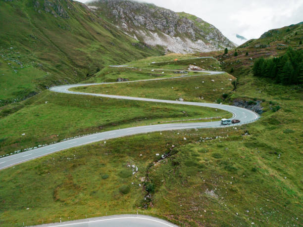 istock Aerial view of camper van on mountain pass road 1652153751