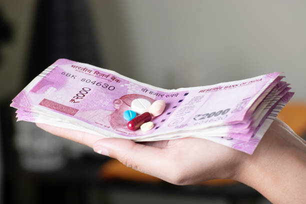 istock Medicine with money in hand 1652153753