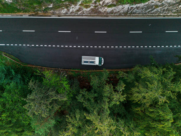 istock Aerial view of camper van on mountain pass road 1652171020