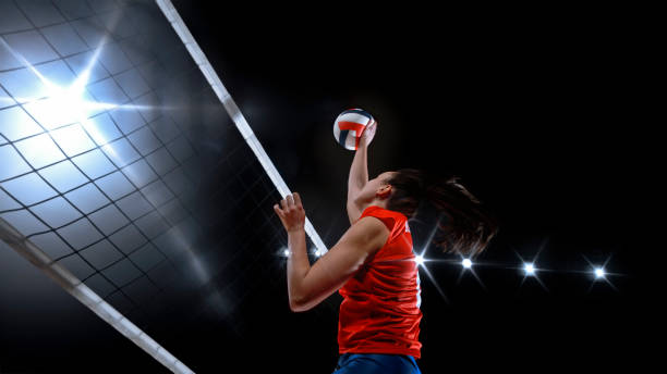istock Woman spiking volleyball 1652222143