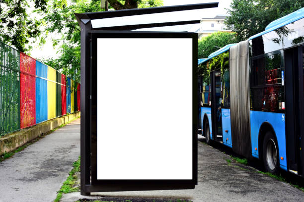istock bus shelter with lightbox. blank white billboard ad panel at bus stop. sample template collage mockup 1652237606