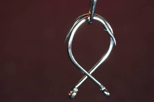 istock Fishing hook on a dark background. Close-up. 1652250940