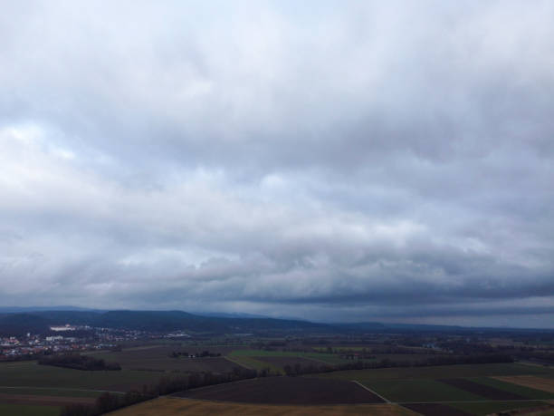 istock Green fields in Bavaria in the valley with aerial view 1652251996