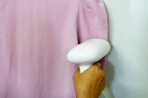 istock Woman ironing clothes with a steam iron 1652271187