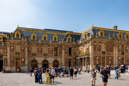 Versailles, France – June 30, 2023: A stunning view of the Royal Courtyard in the Versailles Palace in France.