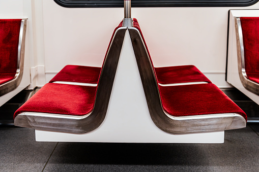 red seat in a train or tram in Toronto