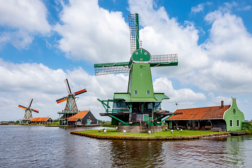 Zaanse Schans, Netherlands - June 3, 2023: famous wooden windmills and canals in Holland