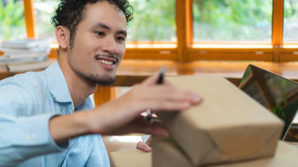 istock Asian Start up SME owner checking the parcel from customer via online shopping platform ,work from home e-commerce business packing and delivery concept 1652293531