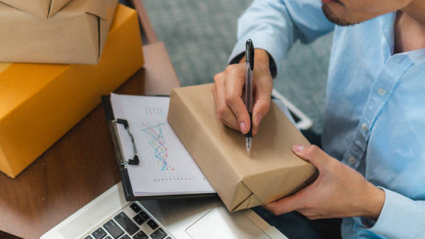 istock Asian Start up SME owner checking the parcel from customer via online shopping platform ,work from home e-commerce business packing and delivery concept 1652293536