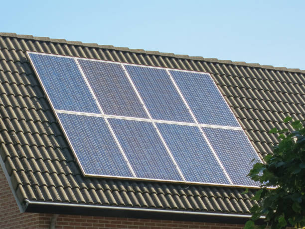 istock Solar panels on house roof energy efficiency 1652322683