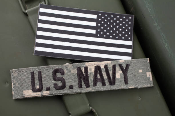 istock U.S. Navy Branch Tape with national US flag patch on green ammo can 1652322725